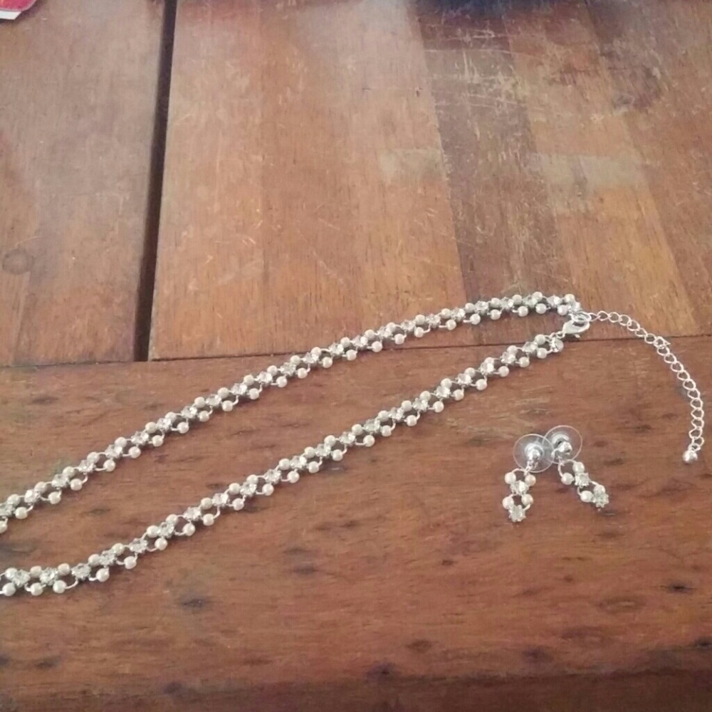 Matching set of earrings with necklace